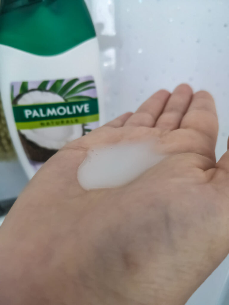 Palmolive Naturals Coconut Shower Milk in hand